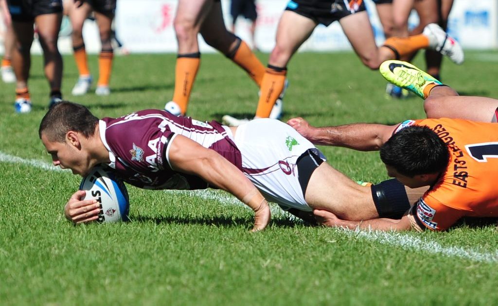 Skilful pivot, Aidan Sezer, crosses for a try for Burleigh Heads against Easts Tigers in the Intrust Cup. Sezer’s slick form has been rewarded with promotion to the Titans. Skilful pivot, Aidan Sezer, crosses for a try for Burleigh Heads against Easts Tigers in the Intrust Cup. Sezer’s slick form has been rewarded with promotion to the Titans.